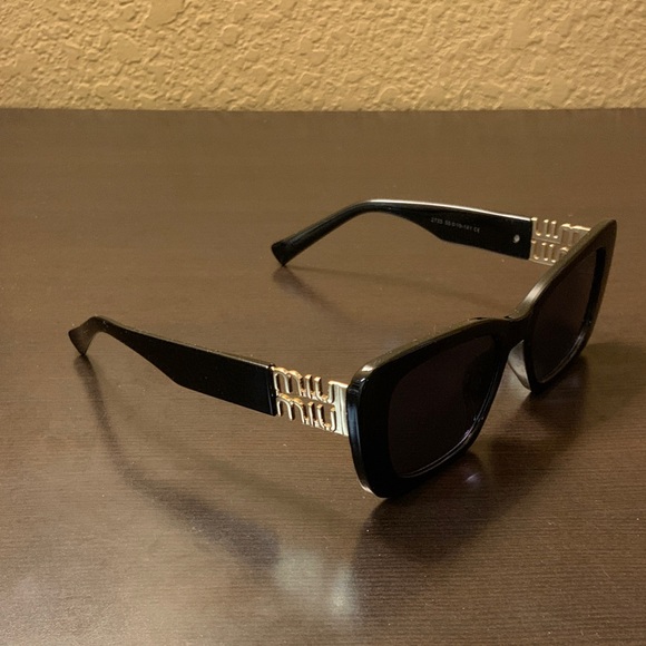 Miu Miu Black Sunglasses with Gold Accents - Picture 1 of 4